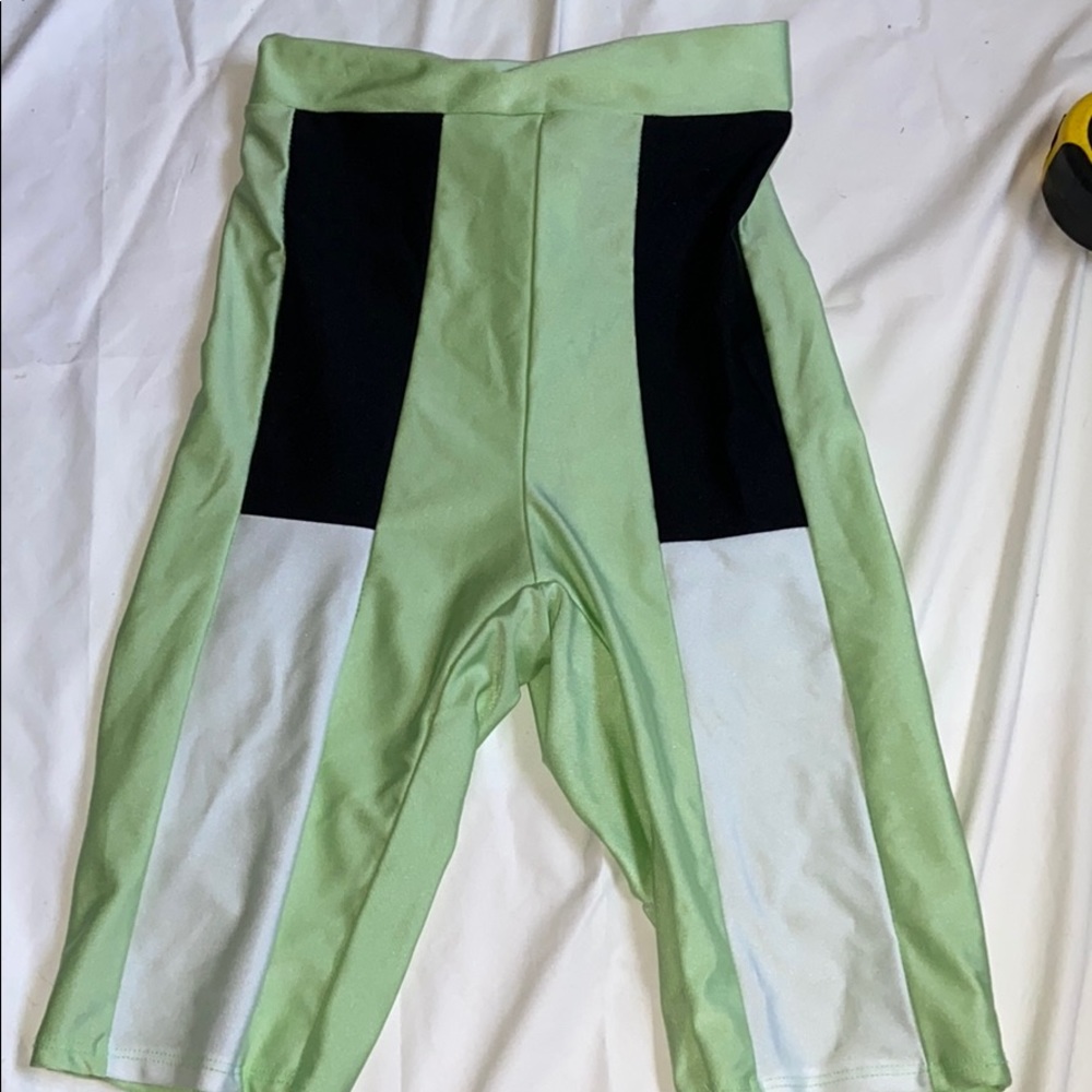 black white and green biker shorts